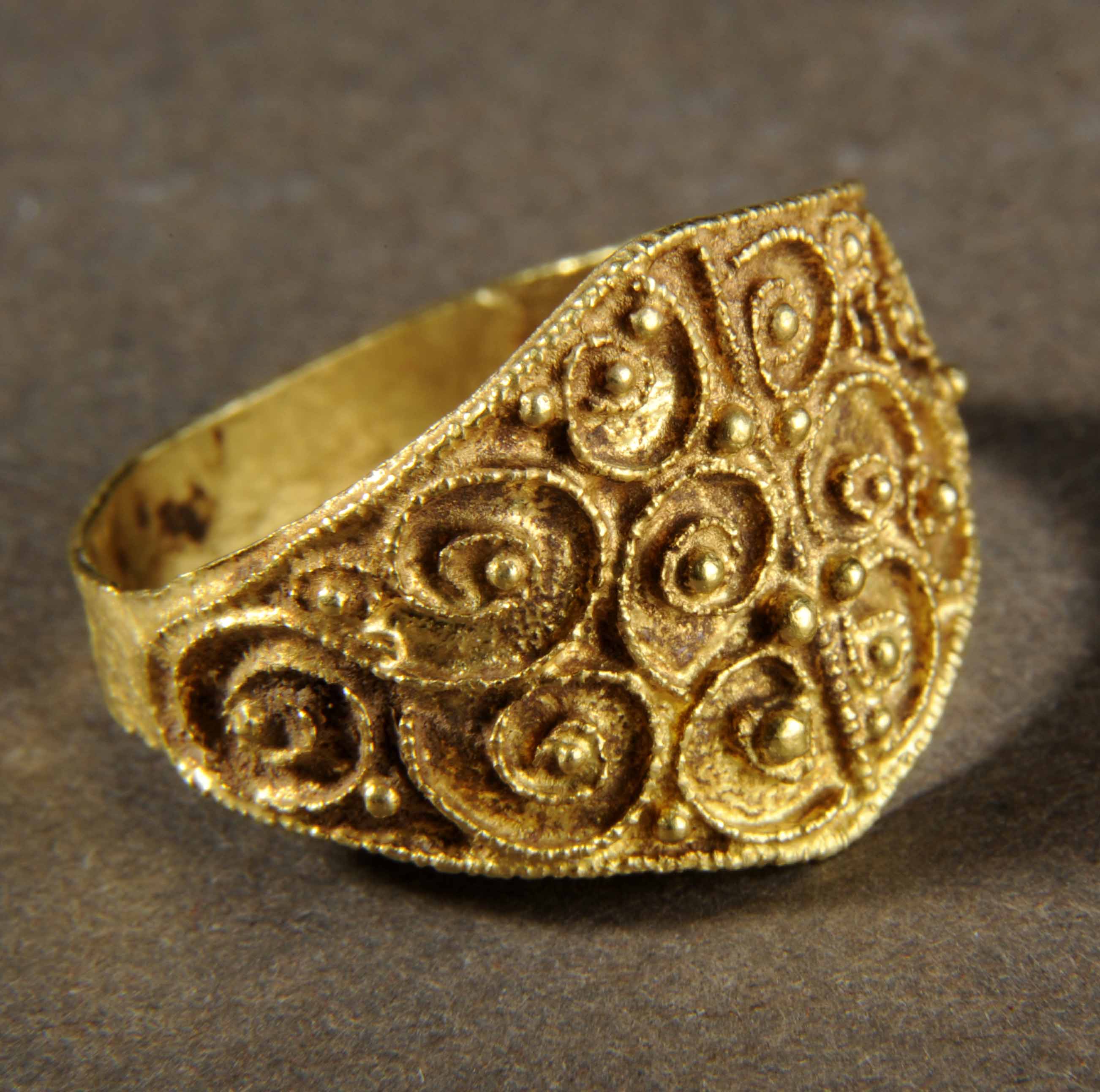 Gold filigree on sale